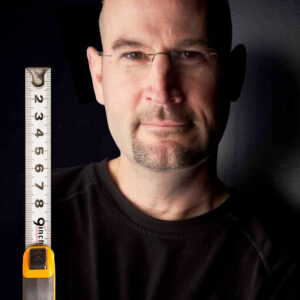 stan phelps headshot with ruler