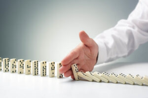 Stopping the domino effect concept for business solution, strate