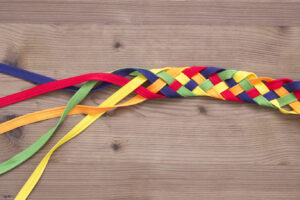 colored ribbons woven diversity